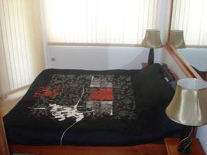 2 person comfort apartment with city view, balcony, an extra bed, and private facilities (bath and shower)